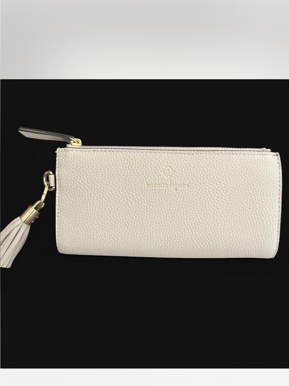 Nanette Lepore Off-White Pebbled Leather Tassel Wristlet